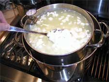 Cooking and stirring the curds